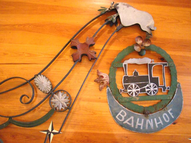 A late 19th century European wrought iron hanging sign from a railroad station — image 2